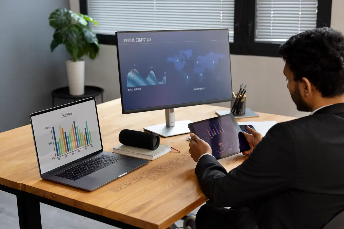 Blog 4 business person looking finance graphs 1